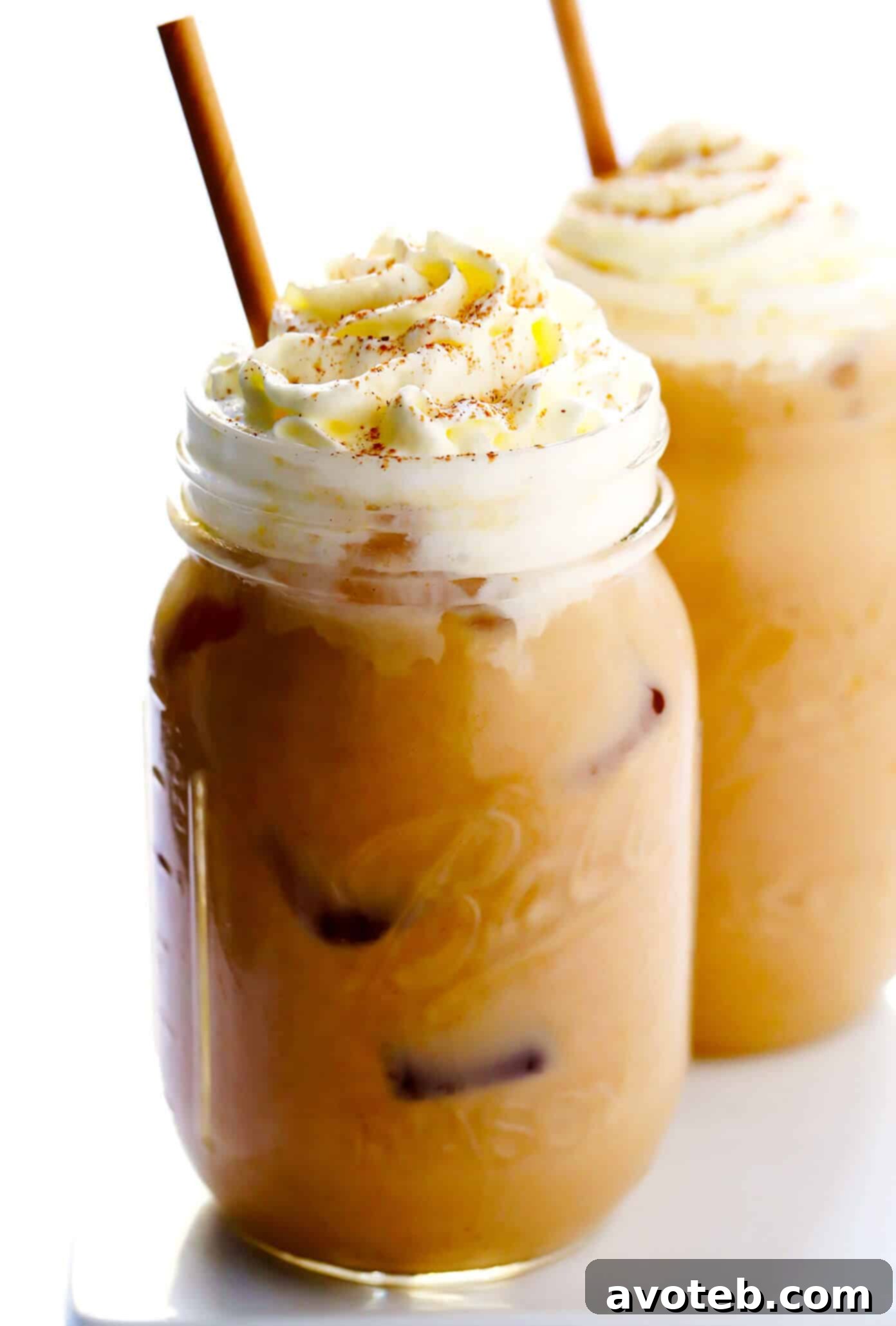 Delicious Homemade Iced Pumpkin Spice Latte with Whipped Cream and Cinnamon