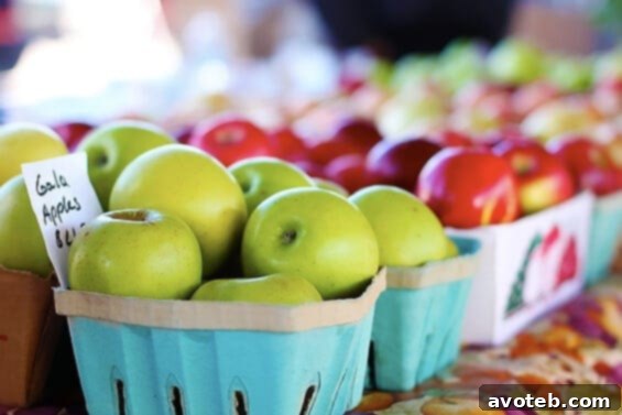 Juicy red apples, perfect for snacking or baking A tempting display of fresh, crisp red apples at the market