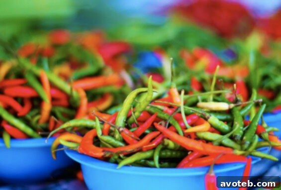 An abundant pile of hot peppers, promising a fiery kick for adventurous cooks at The City Market.