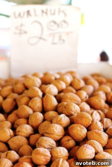 A generous display of walnuts, evoking thoughts of both culinary uses and nostalgic memories.