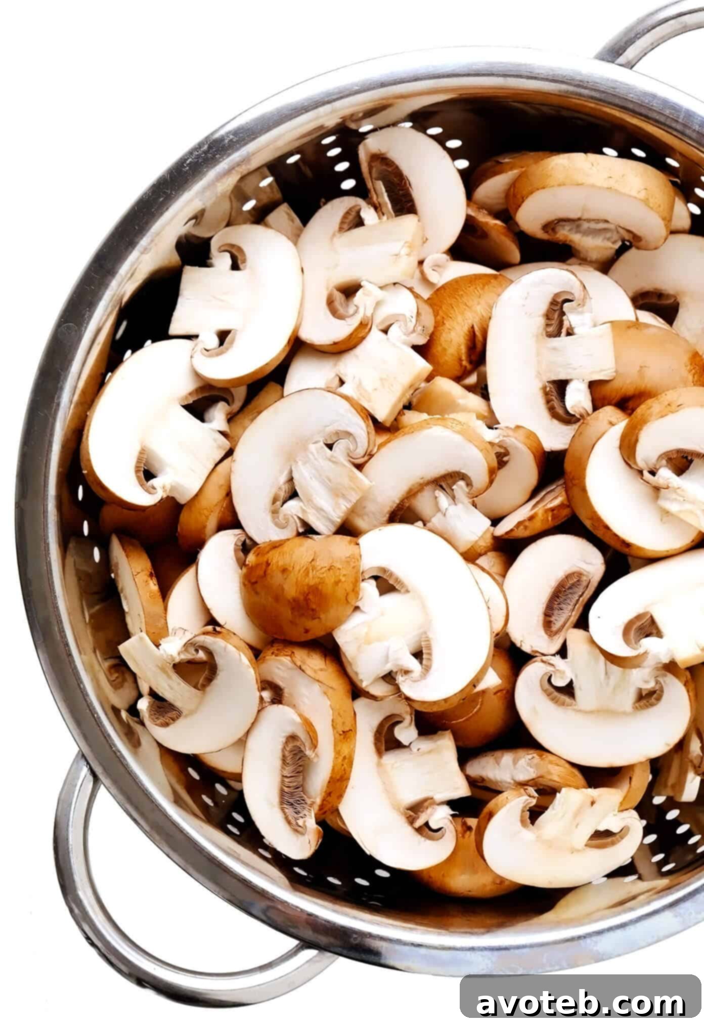 Fresh Baby Bella (Cremini) Mushrooms in a Strainer