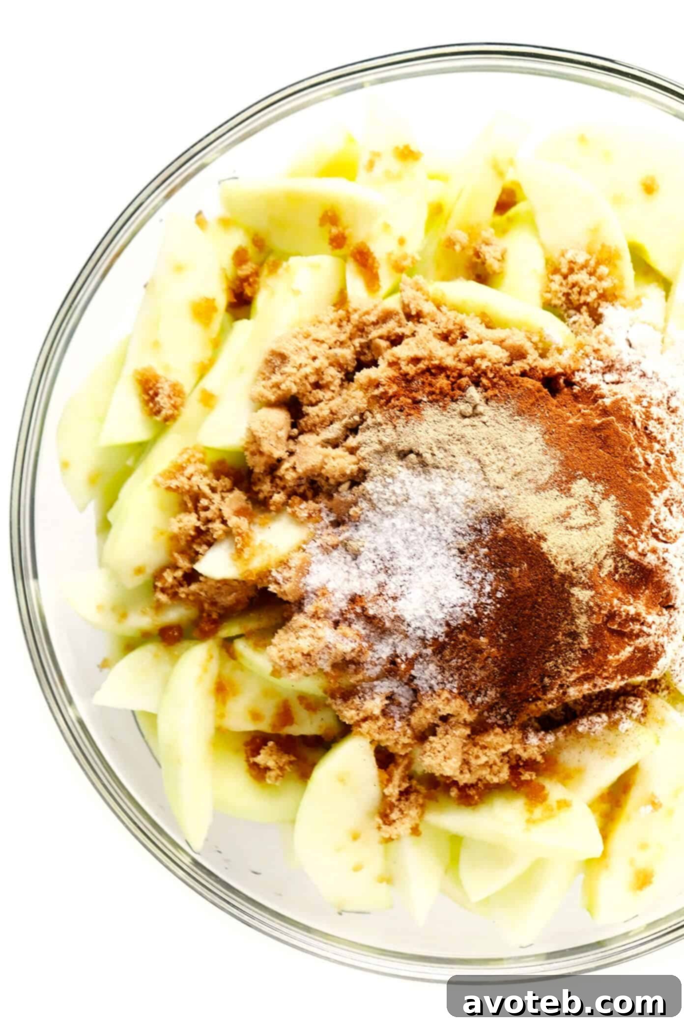This easy Apple Pandowdy recipe is made with a delicious baked apple cinnamon pie filling topped with toasted puff pastry bites and a light dusting of powdered sugar. Absolutely delicious served warm with vanilla ice cream, and the perfect dessert for the holidays. | gimmesomeoven.com #apple #pandowdy #pie #dessert #bake #crisp #puffpastry #filling #thanksgiving #christmas Ingredients for Apple Pie Filling in a Bowl