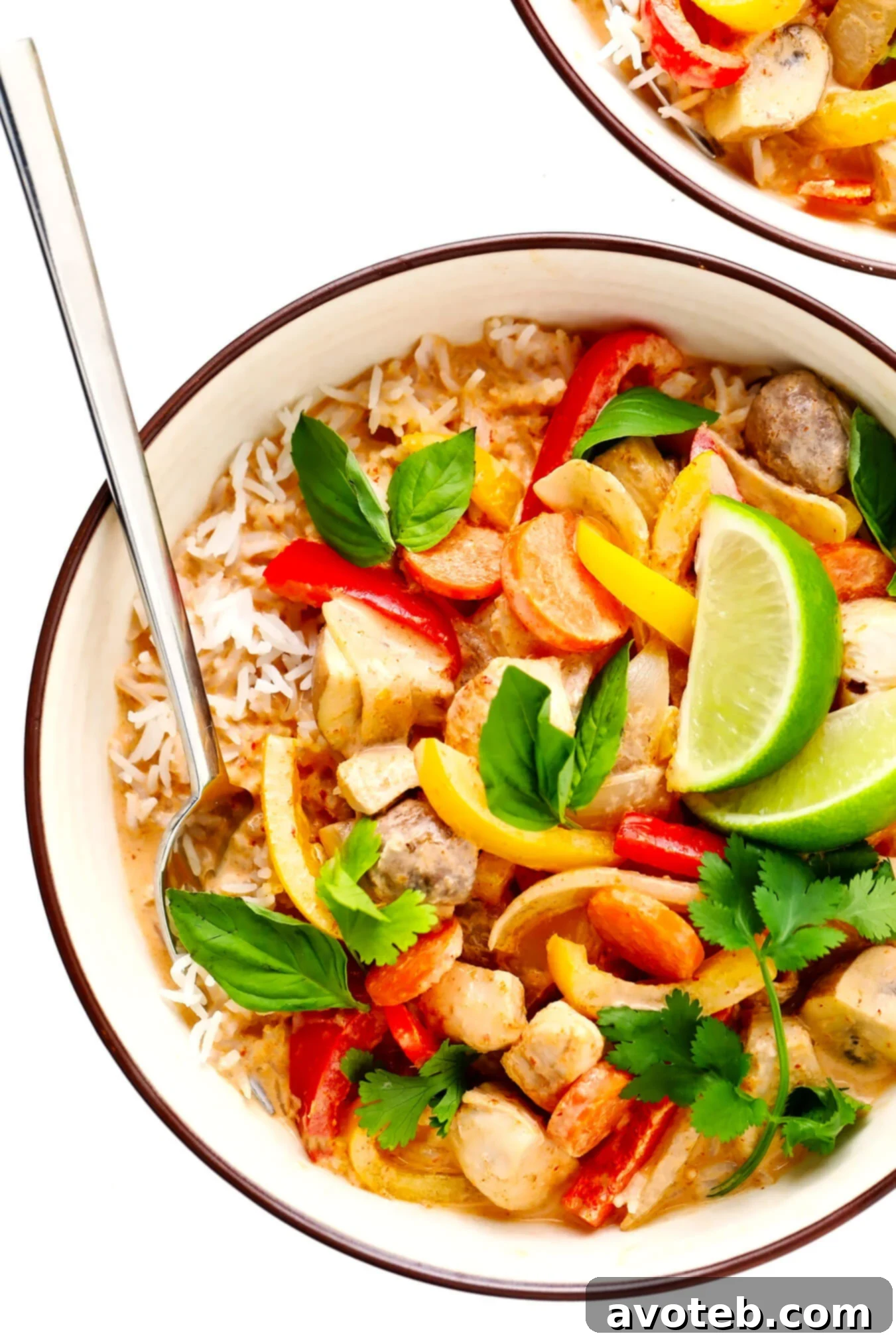 A vibrant bowl of homemade Thai Chicken Red Curry, garnished with fresh cilantro, ready to be served over rice.