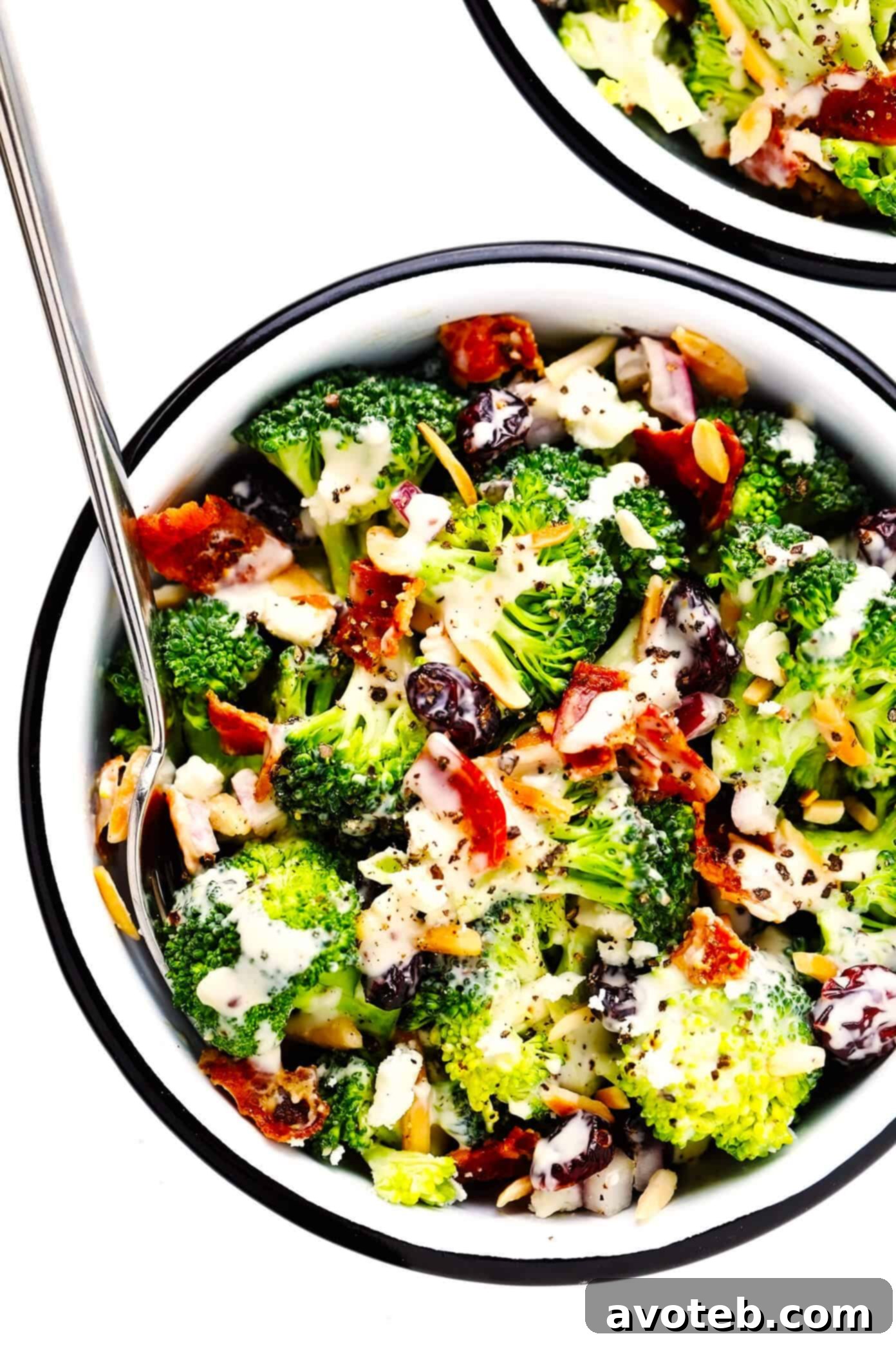 Delicious Broccoli Salad with crispy bacon, dried cranberries, and toasted almonds