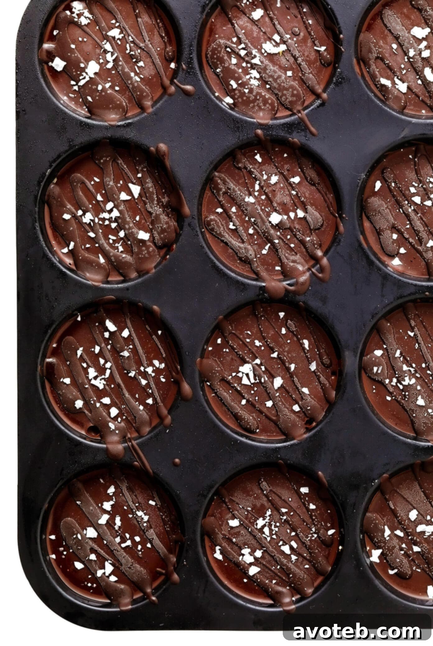 Salted Chocolate Peanut Butter Oat Cups chilling in a muffin pan