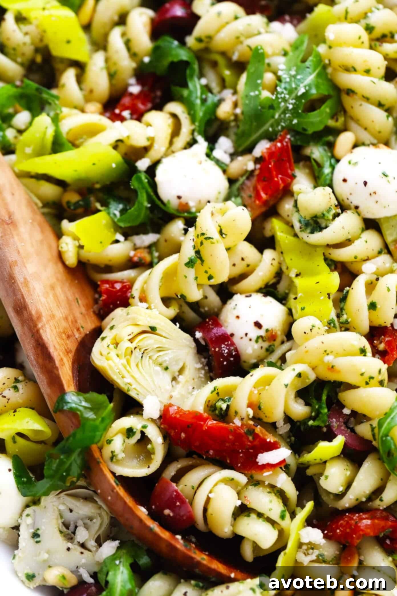Italian Pesto Pasta Salad close up in a serving bowl