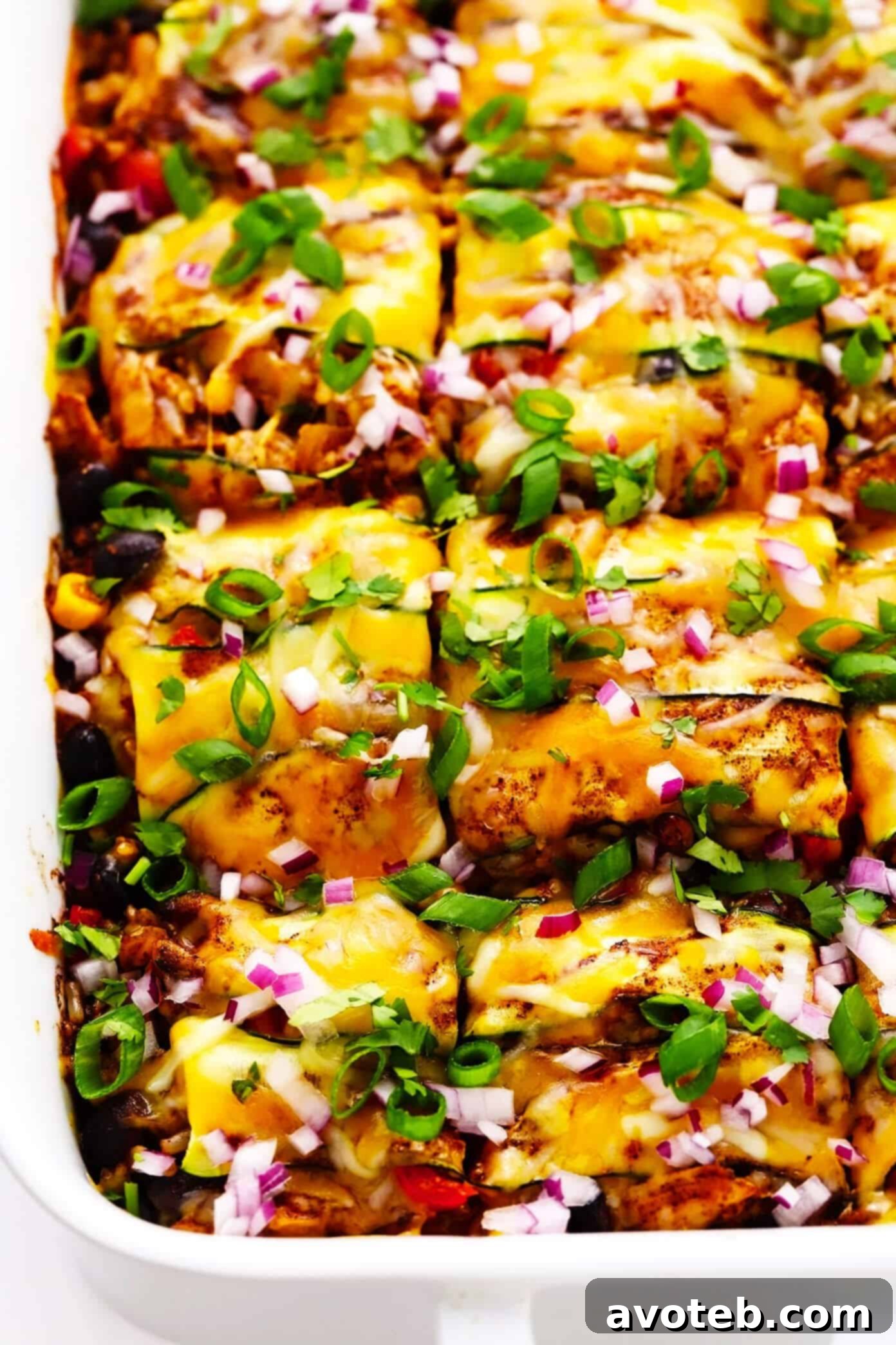Layered Zucchini Enchilada Casserole with Fresh Toppings