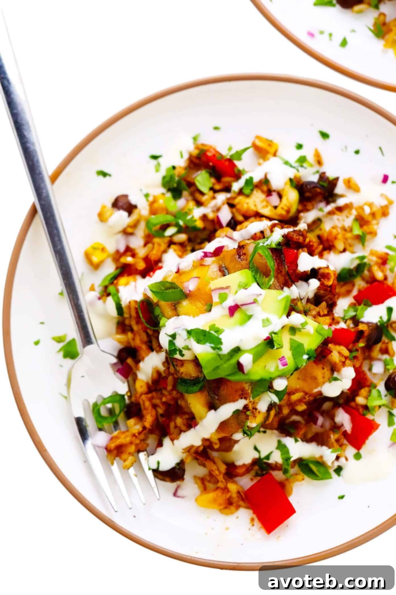 Individual Slice of Zucchini Enchilada Casserole on a Plate