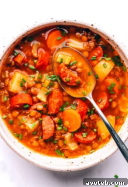 Spanish Chorizo Lentil Stew finished dish image for recipe card.