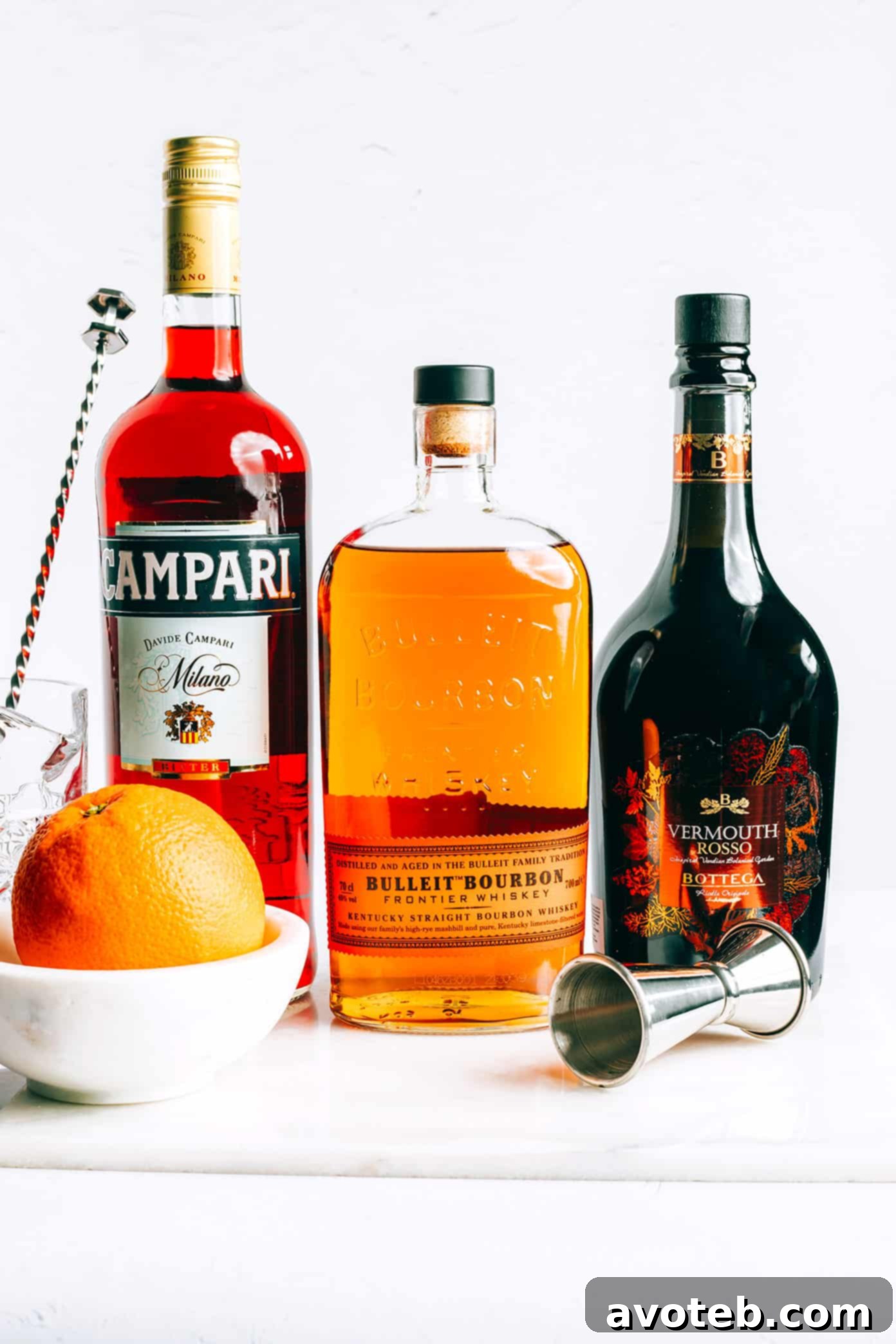 Boulevardier Ingredients - Campari, Bourbon, Sweet Vermouth and Orange