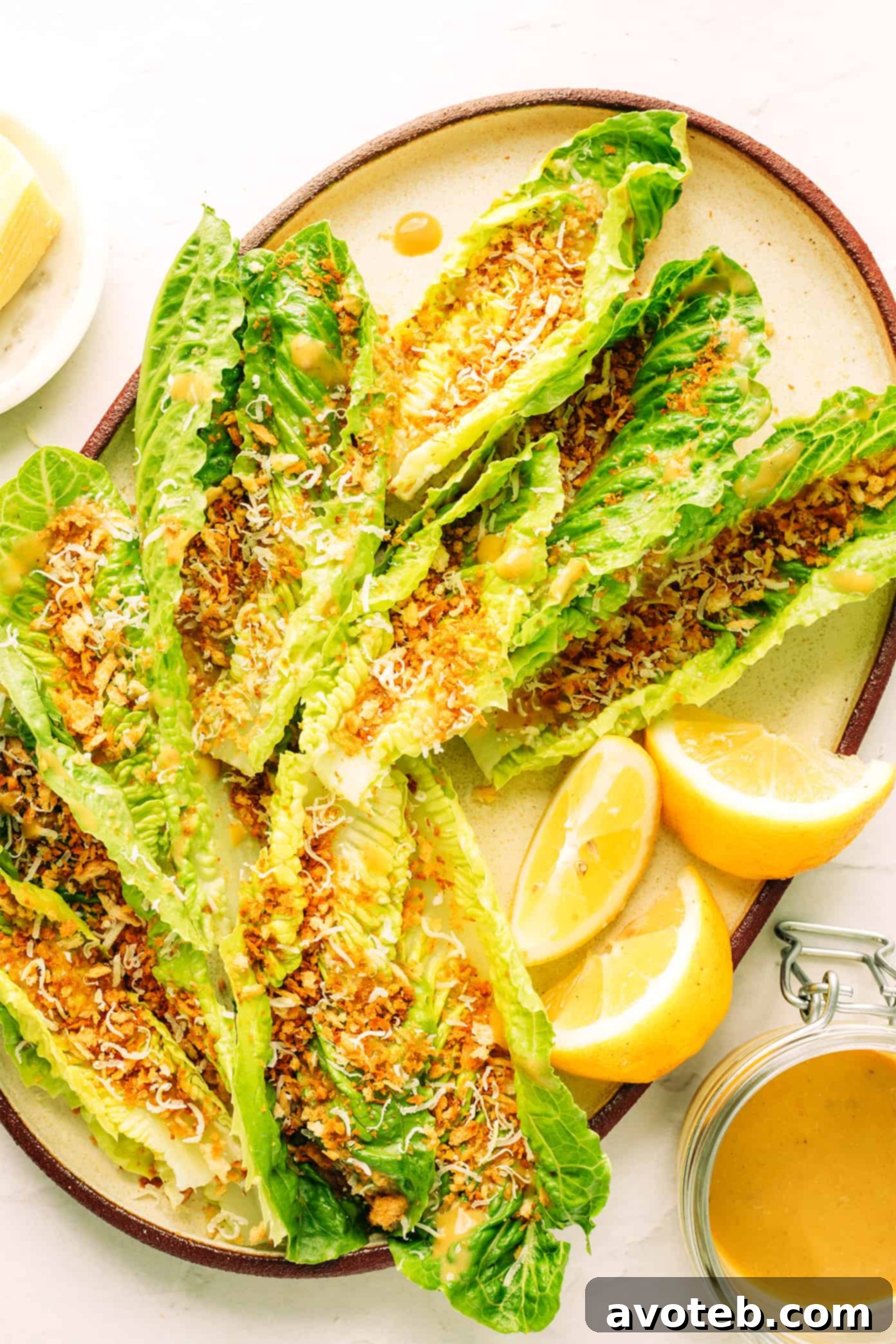 Vibrant Caesar-ish salad, generously tossed with golden Parmesan breadcrumbs and a luscious anchovy vinaigrette.