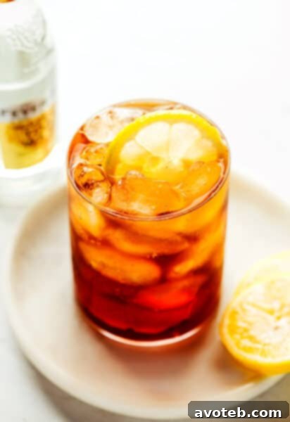 A refreshing Cold Brew Tonic with a lemon slice