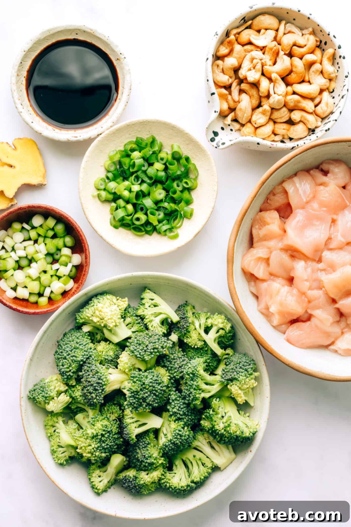 Cooking Cashew Chicken and Broccoli Stir-Fry in a wok