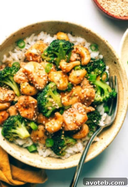 Delicious Cashew Chicken and Broccoli Stir-Fry served over rice