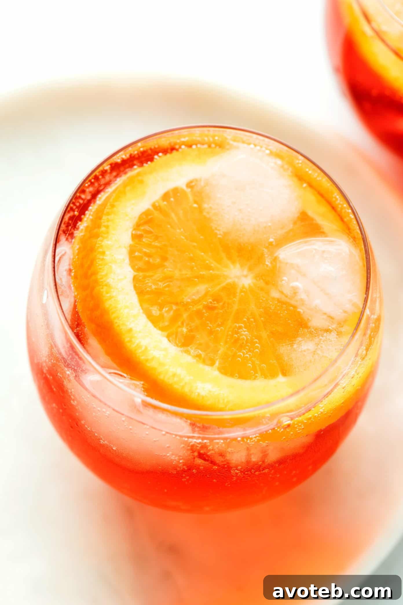 Four Campari Spritz cocktails prepared and ready to serve