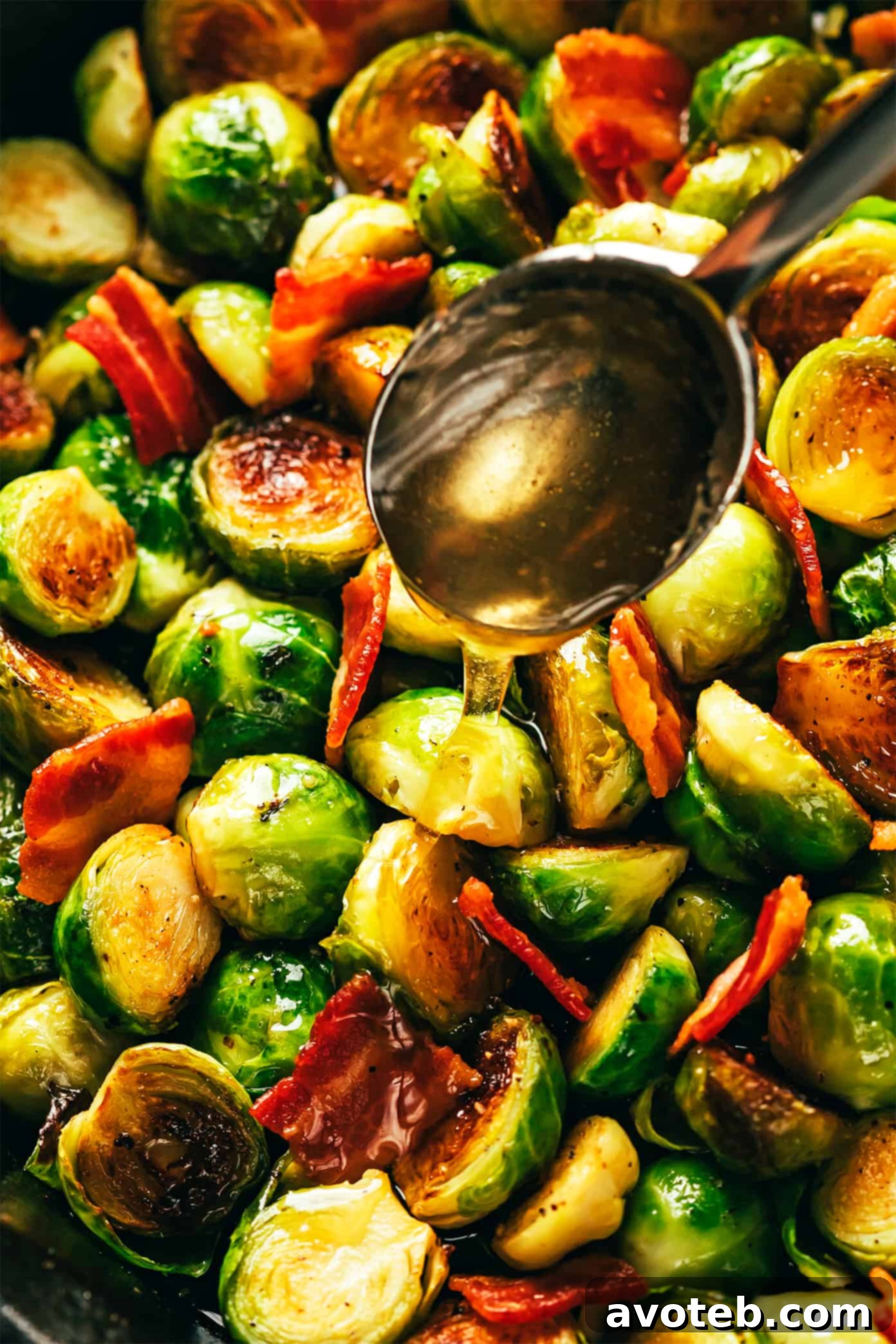 These bacon Brussels sprouts are easy to make and tossed with an irresistible drizzle of hot honey. The perfect side dish for Thanksgiving, dinner parties, or anytime you're just craving some extra-delicious vegetables. Bacon Brussels Sprouts with Hot Honey