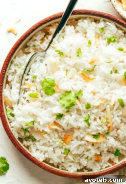 A beautifully presented bowl of coconut rice, ready to be enjoyed.