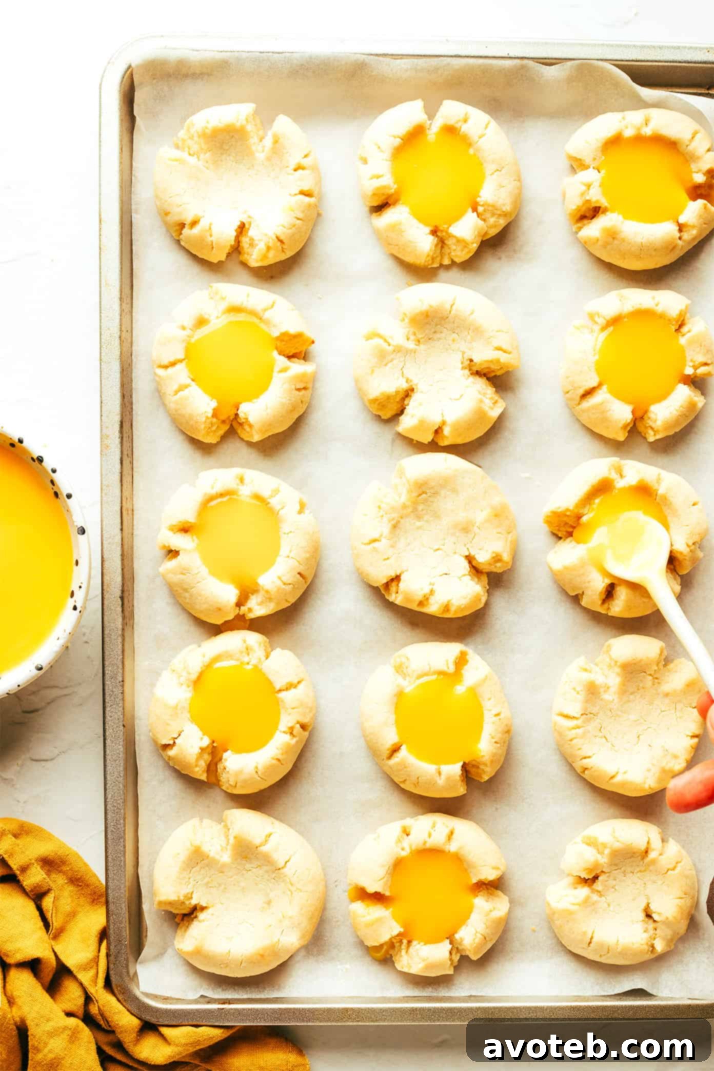 Lemon Curd Thumbprint Cookies on a cooling rack