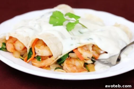 Delicious Verde Shrimp Enchiladas with Jalapeno Cream Sauce, a flavorful Mexican-inspired dish