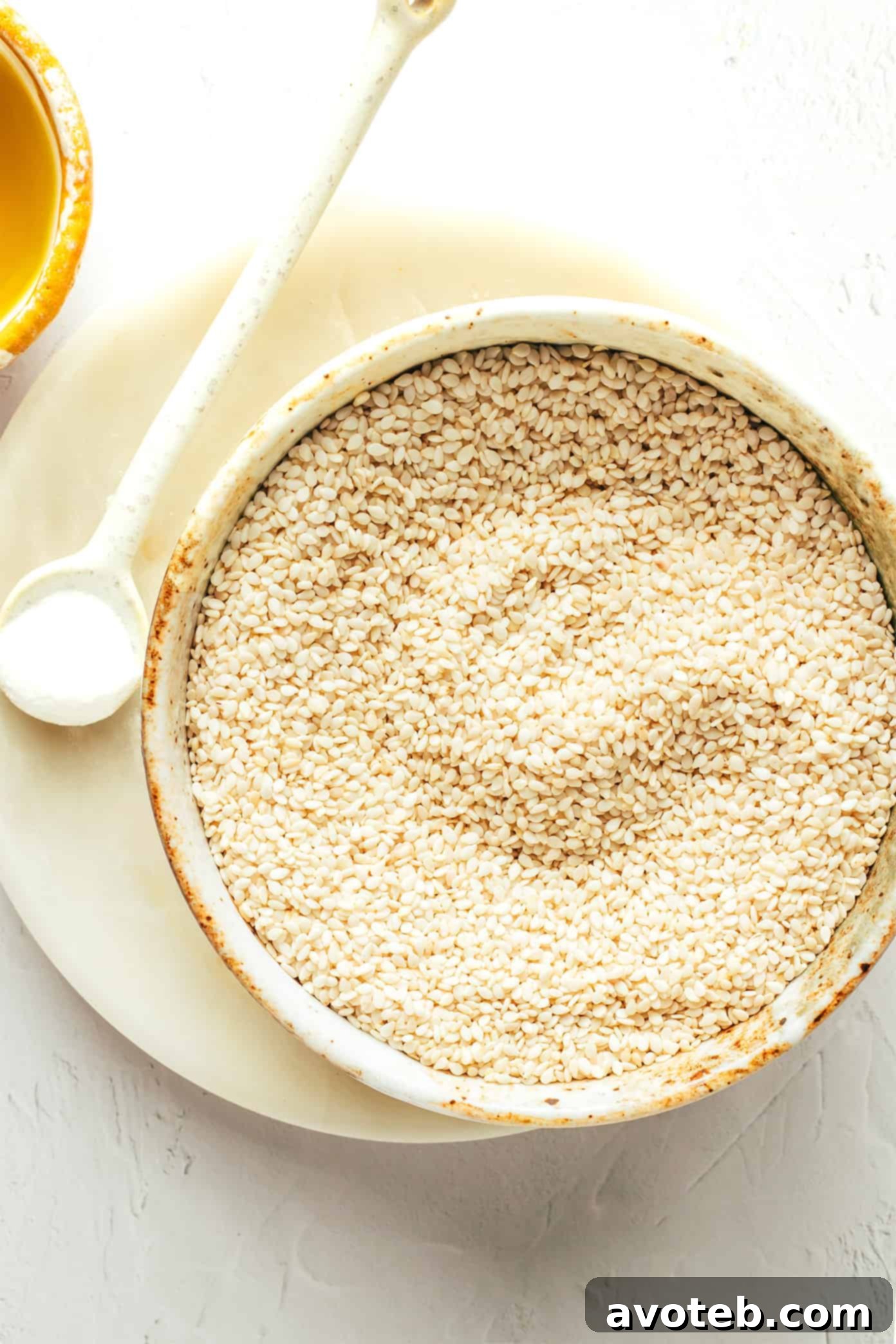 Tahini ingredients including sesame seeds, salt and olive oil