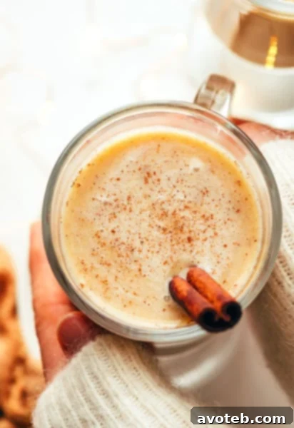 A finished mug of hot buttered rum, ready to be served, from the recipe card.