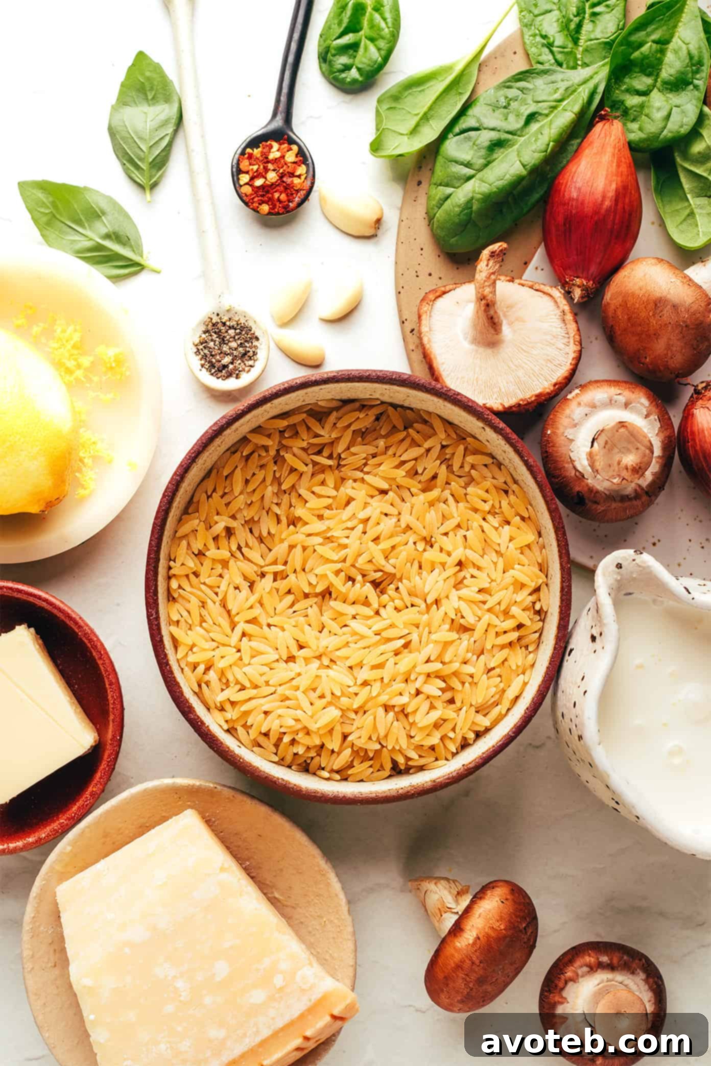 A close-up shot of the creamy garlic mushroom orzo pasta, showing the texture of the orzo and sautéed mushrooms.