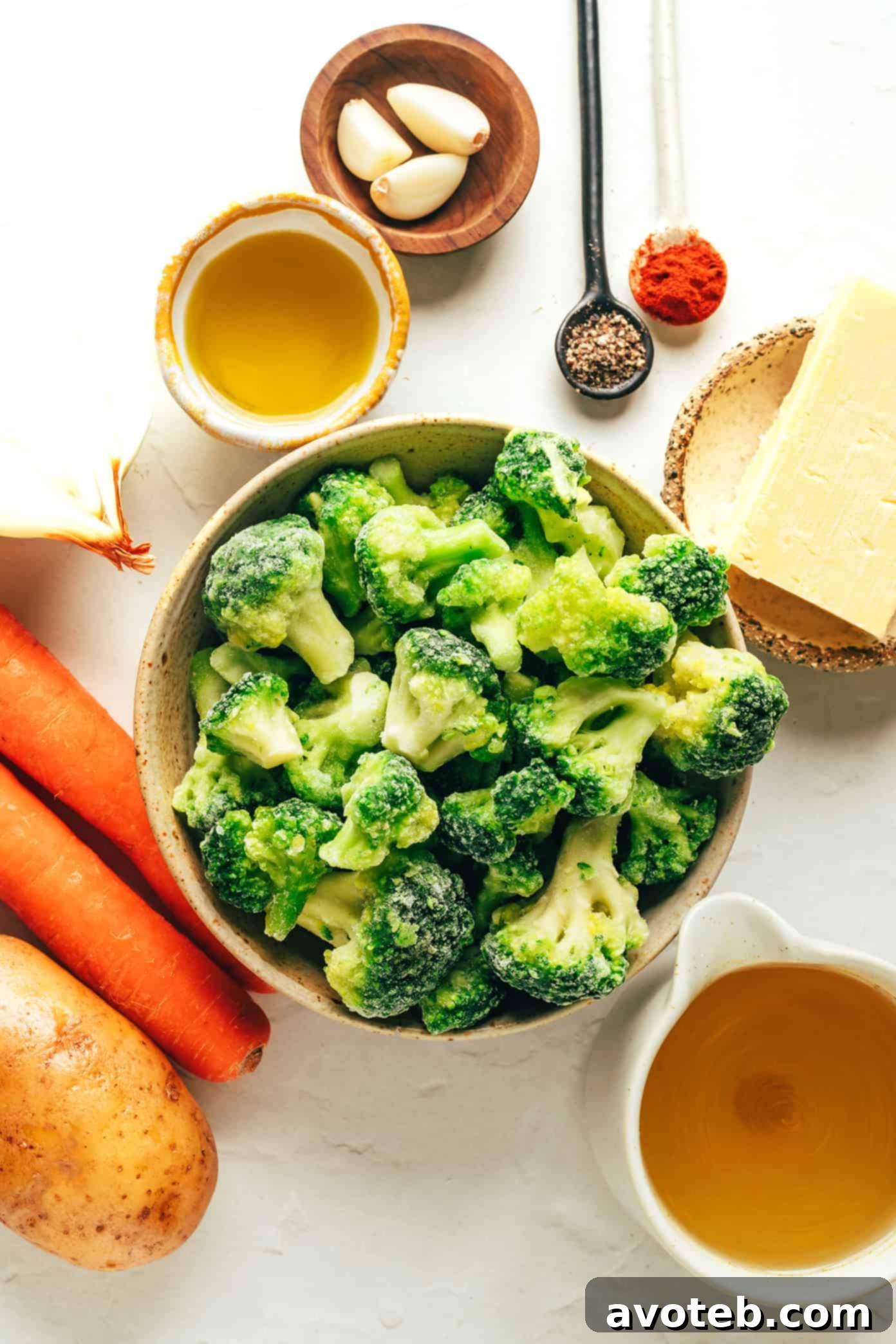 Close-up shot of the vibrant, creamy texture of lightened-up broccoli cheese soup, showing finely puréed vegetables.