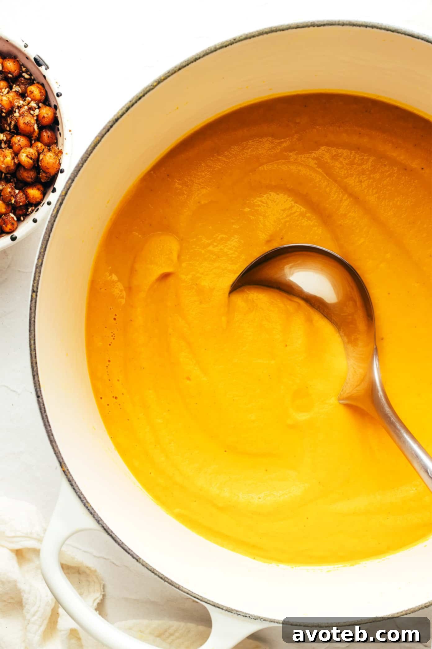 Finished Roasted Carrot Soup with Za'atar Chickpeas and bread.