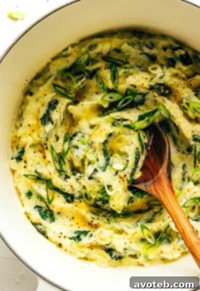 A delicious bowl of Irish Colcannon with melted butter and fresh scallions.