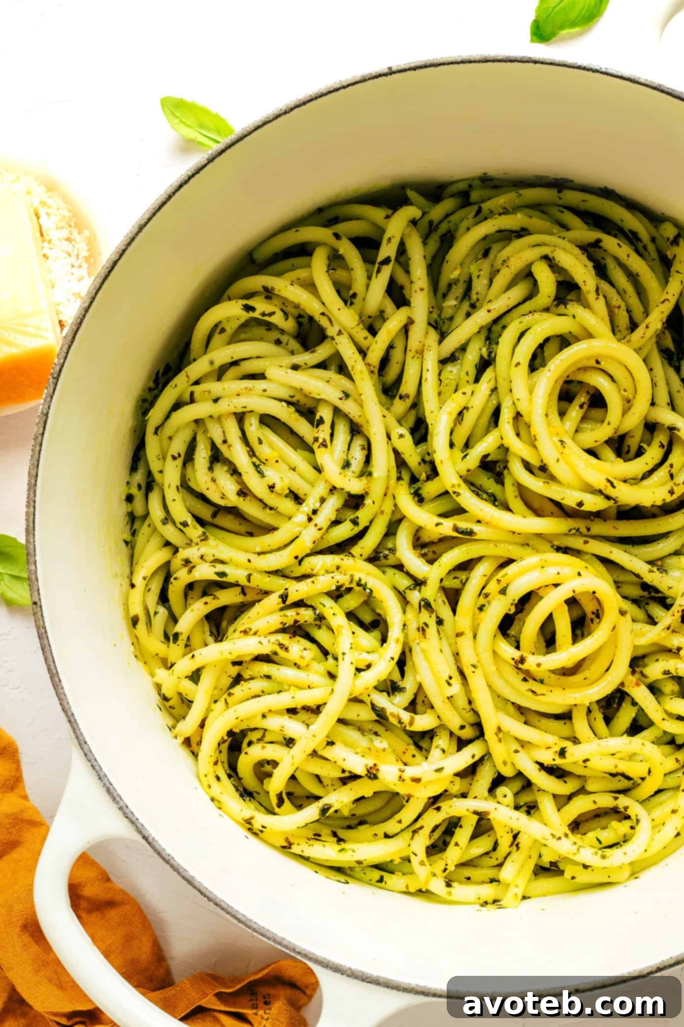 Lemon basil butter pasta in pot made with bucatini pasta