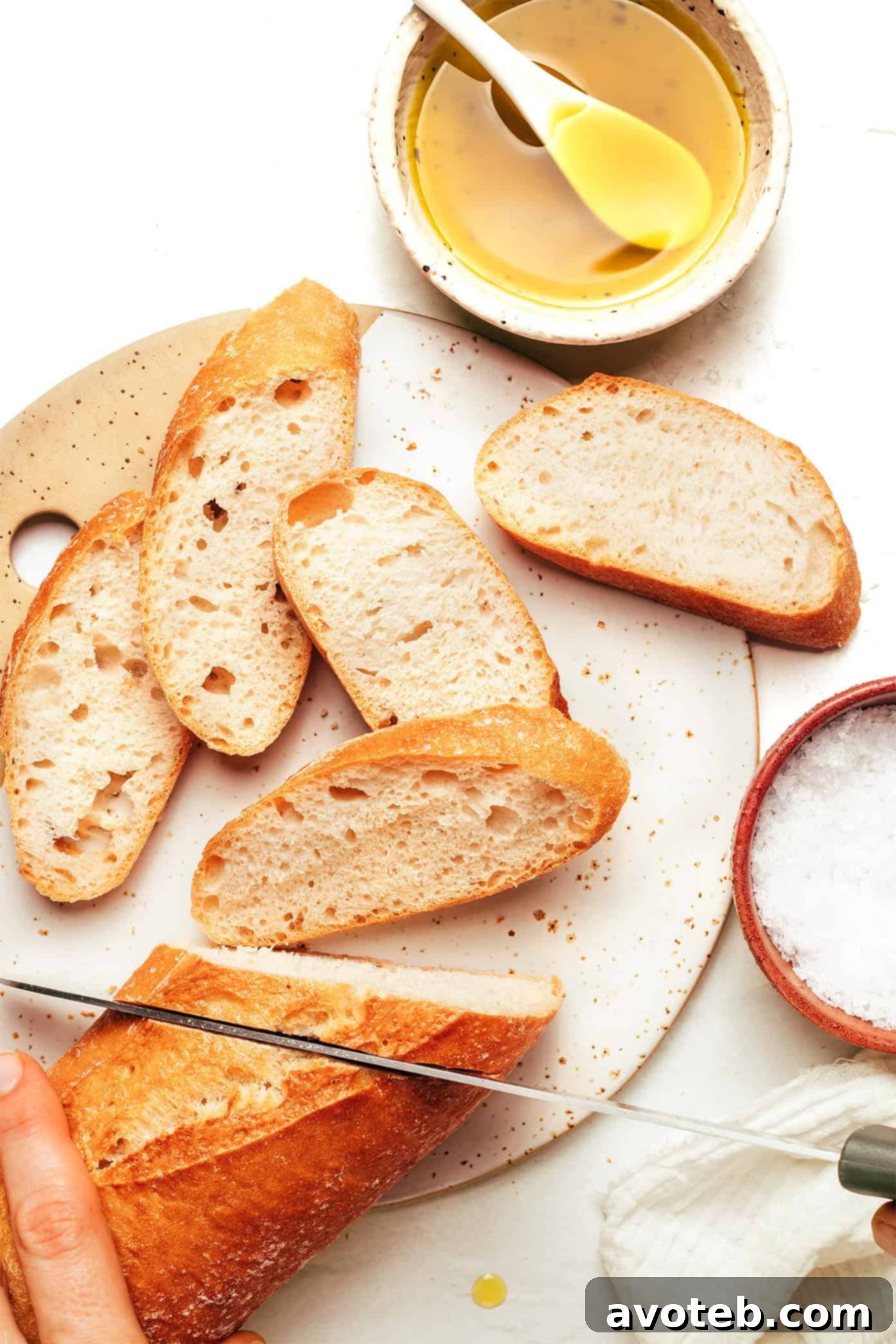 Several slices of perfectly baked crostini laid out, showcasing their golden-brown color and crisp texture, ready for toppings.