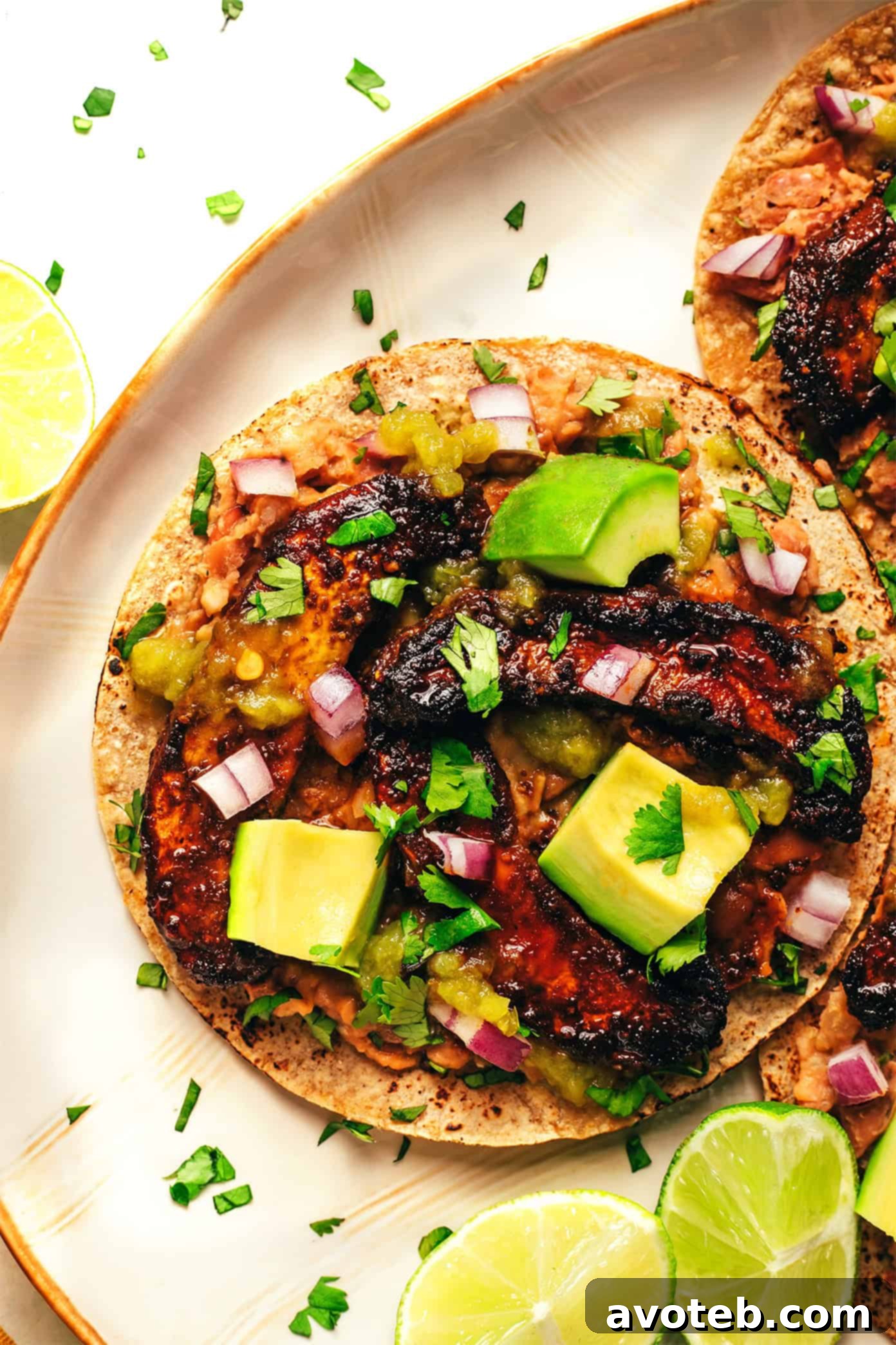 Several Portobello Mushroom Tacos arranged attractively on a serving platter.