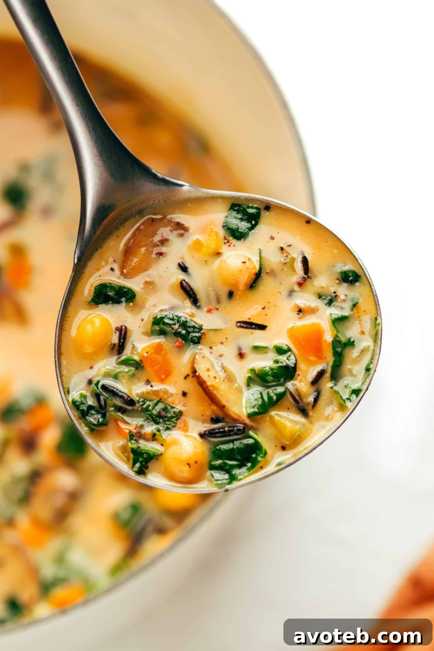 Garnished bowl of Pumpkin Wild Rice Soup