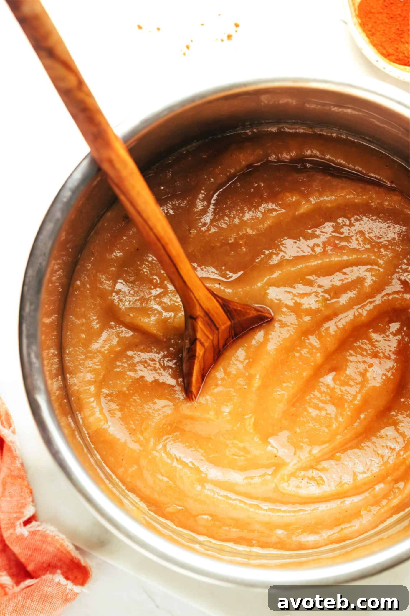 Homemade Instant Pot applesauce served in a bowl with a spoon