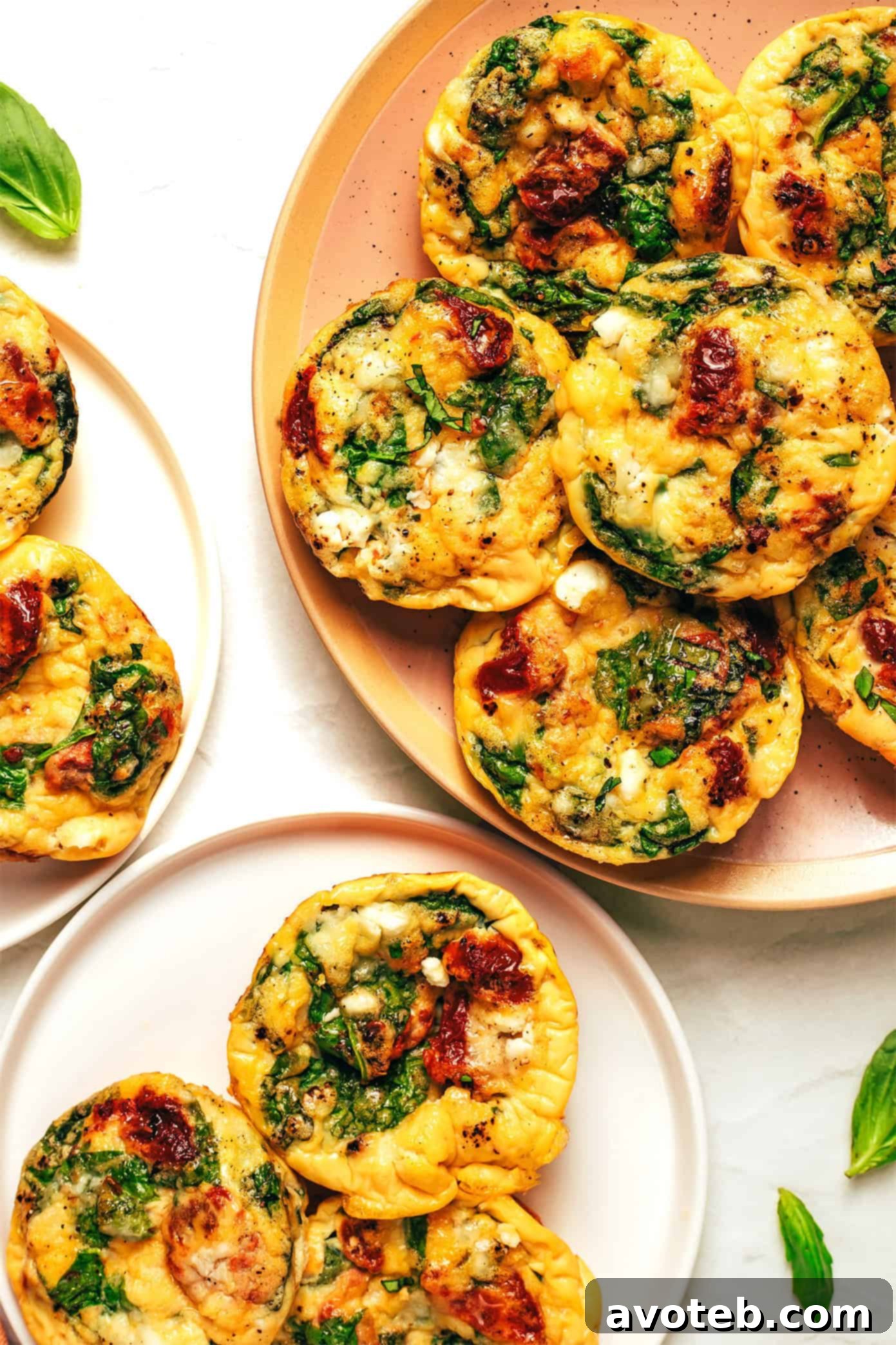 Six baked high-protein egg bites in a muffin tin, ready to be removed