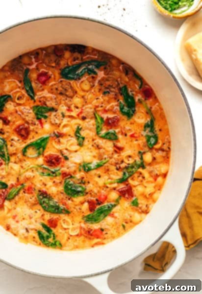 Marry Me Soup with Italian Sausage and pasta in a bowl.