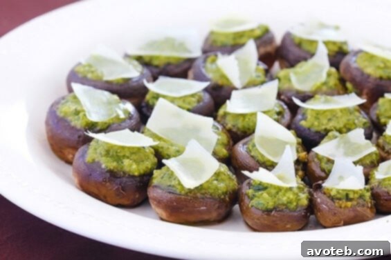 Easy Pesto Stuffed Mushrooms on a platter, ready to serve.
