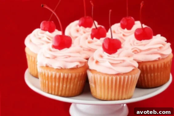 A plate of freshly baked Cherry Vanilla Cupcakes ready to be served
