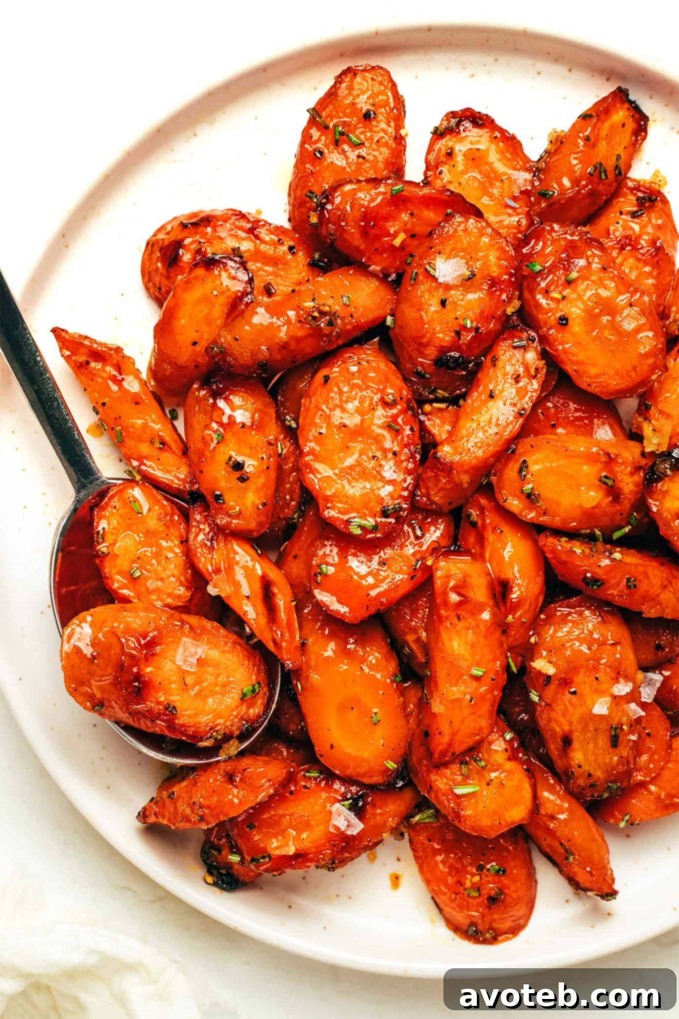 A colorful array of roasted carrots presented beautifully in a serving dish.