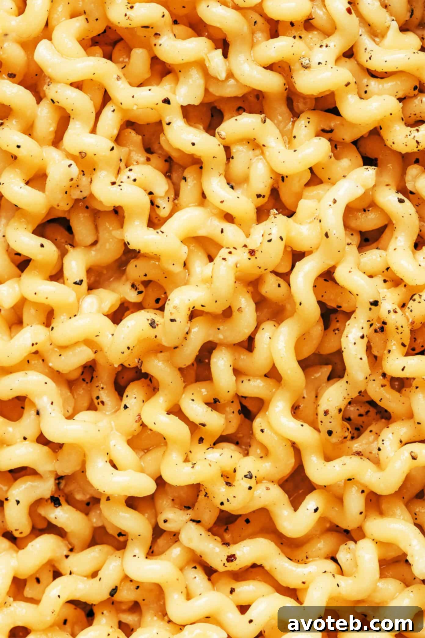 A beautifully plated bowl of garlic miso pasta, ready to be eaten.