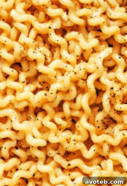 A beautifully arranged plate of Garlic Miso Pasta, ready to be served.