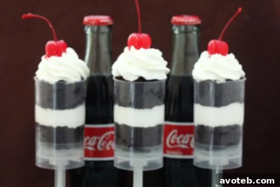 Coke Float Push-Up Pops recipe card image featuring the layered dessert