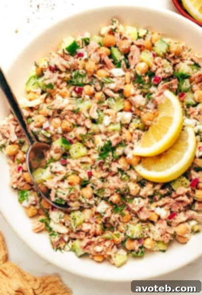 Lemon Tahini Chickpea Tuna Salad with a creamy, vibrant dressing and fresh ingredients.
