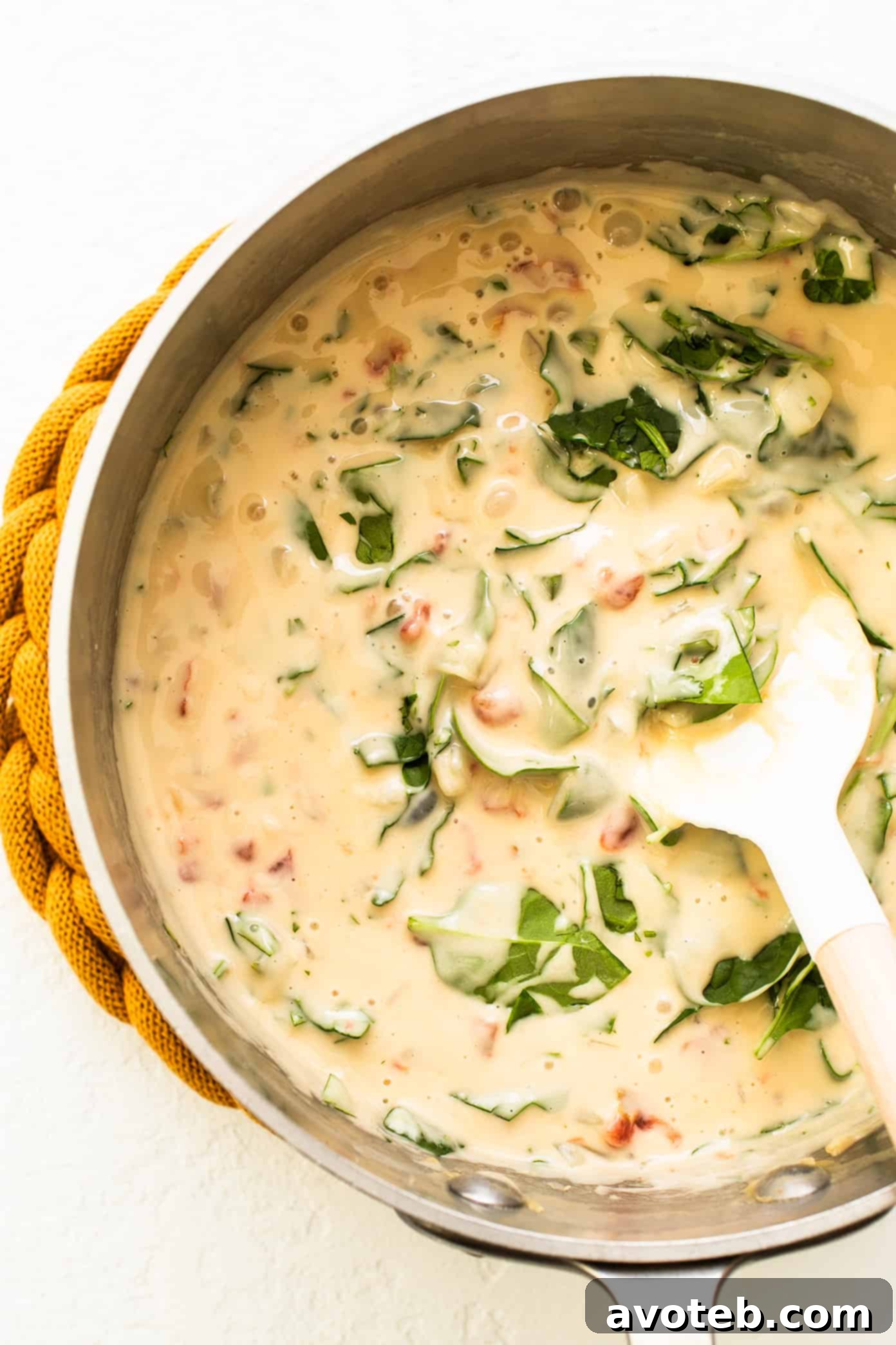 Homemade Queso Blanco: A Quick and Easy Recipe Queso Blanco in Saucepan - creamy, melty, delicious white cheese dip