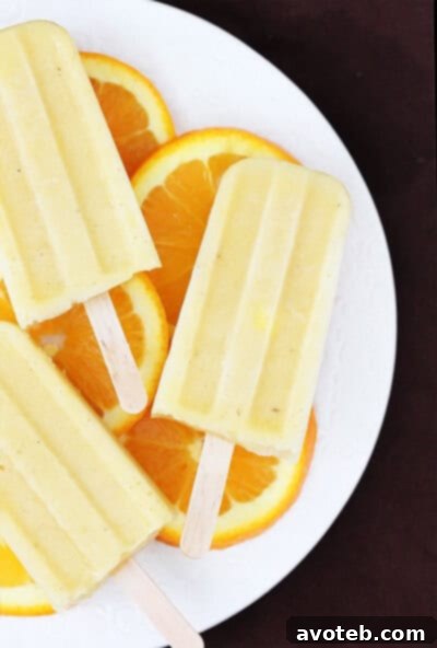 Pineapple Orange Banana Popsicles Pineapple Orange Banana Popsicles with fresh fruit