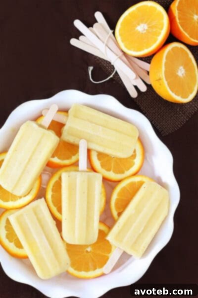 Pineapple Orange Banana Popsicles Close-up of Pineapple Orange Banana Popsicles