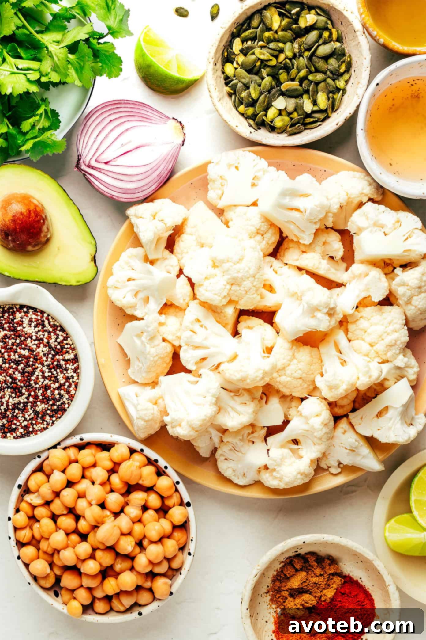 Close-up of Chili-Lime Roasted Cauliflower, Chickpea, and Quinoa Bowls ready to be served