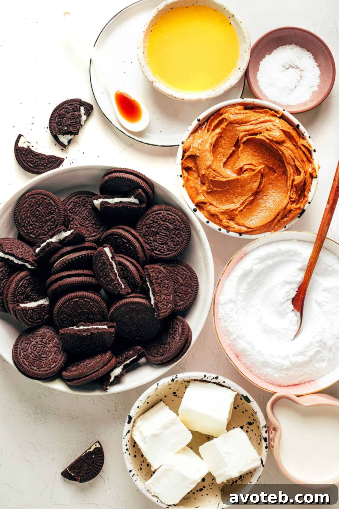 Decadent Peanut Butter Dream Pie 3 A visual guide showing all the key ingredients laid out neatly for making a no-bake peanut butter pie: Oreo cookies, creamy peanut butter, heavy cream, cream cheese, powdered sugar, vanilla extract, and salt.