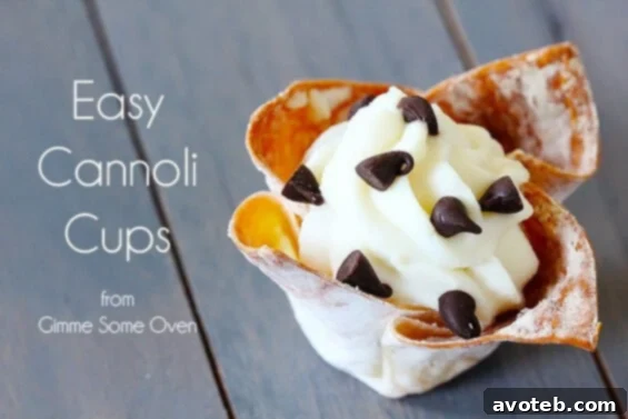 A tray of freshly baked Cannoli Cups, garnished with chocolate chips.