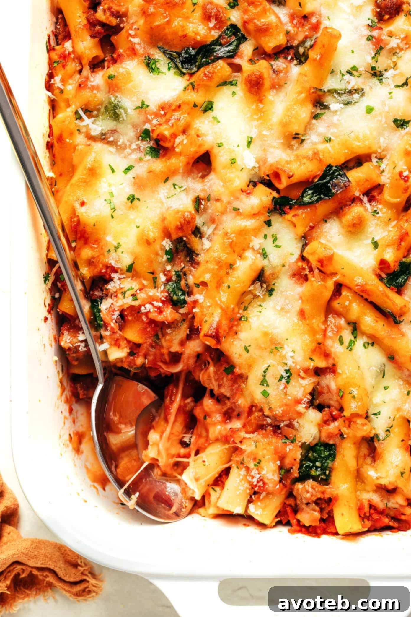 A close-up of a portion of baked ziti on a plate